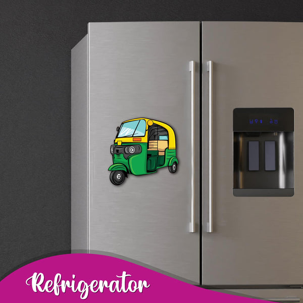 Close-up of the auto rickshaw magnet on a refrigerator.