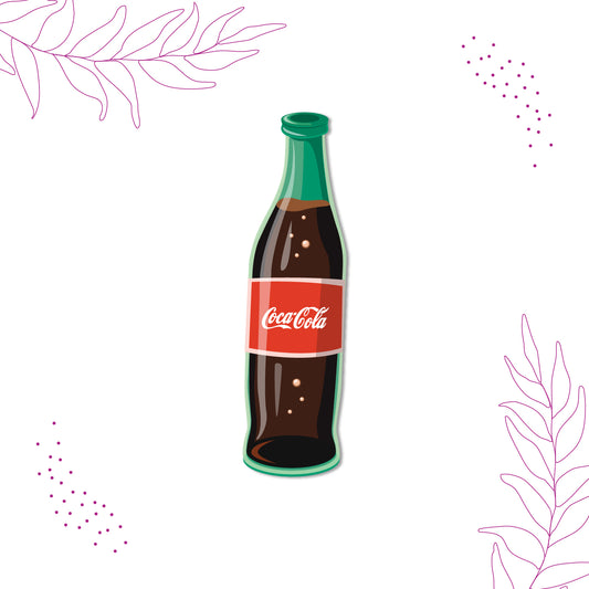 Close-up of a detailed Coca-Cola bottle magnet.