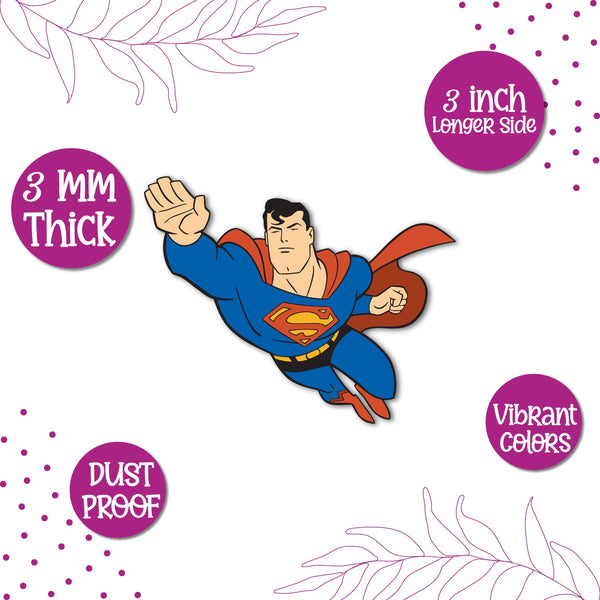 A Superman superhero figure in a flying pose on a fridge magnet.