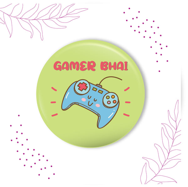 Gamer Bhai metal magnet stuck to a refrigerator door, perhaps in a gaming room
