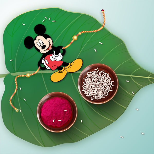 Close-up detail of Mickey Mouse design on wooden Rakhi with Rudraksha beads.