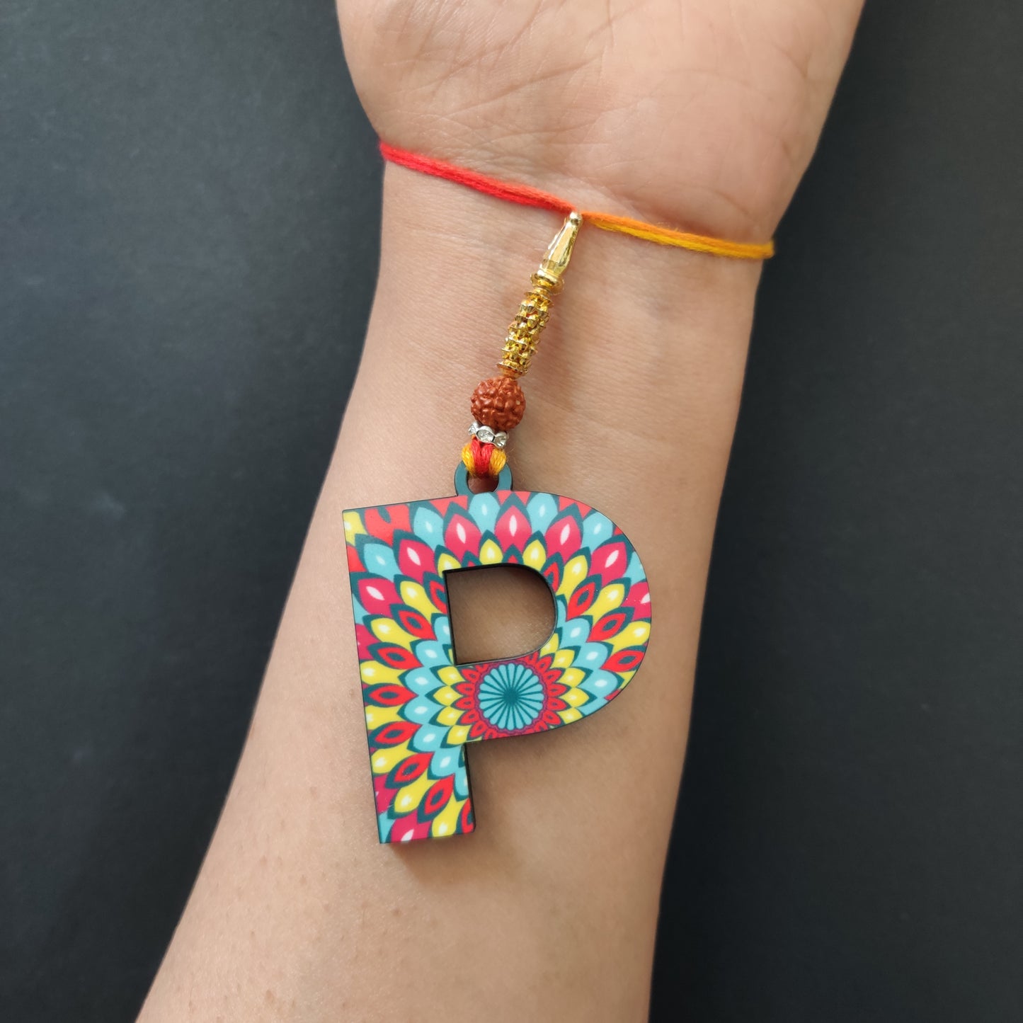 Alphabet P Wooden Lumba Rakhi