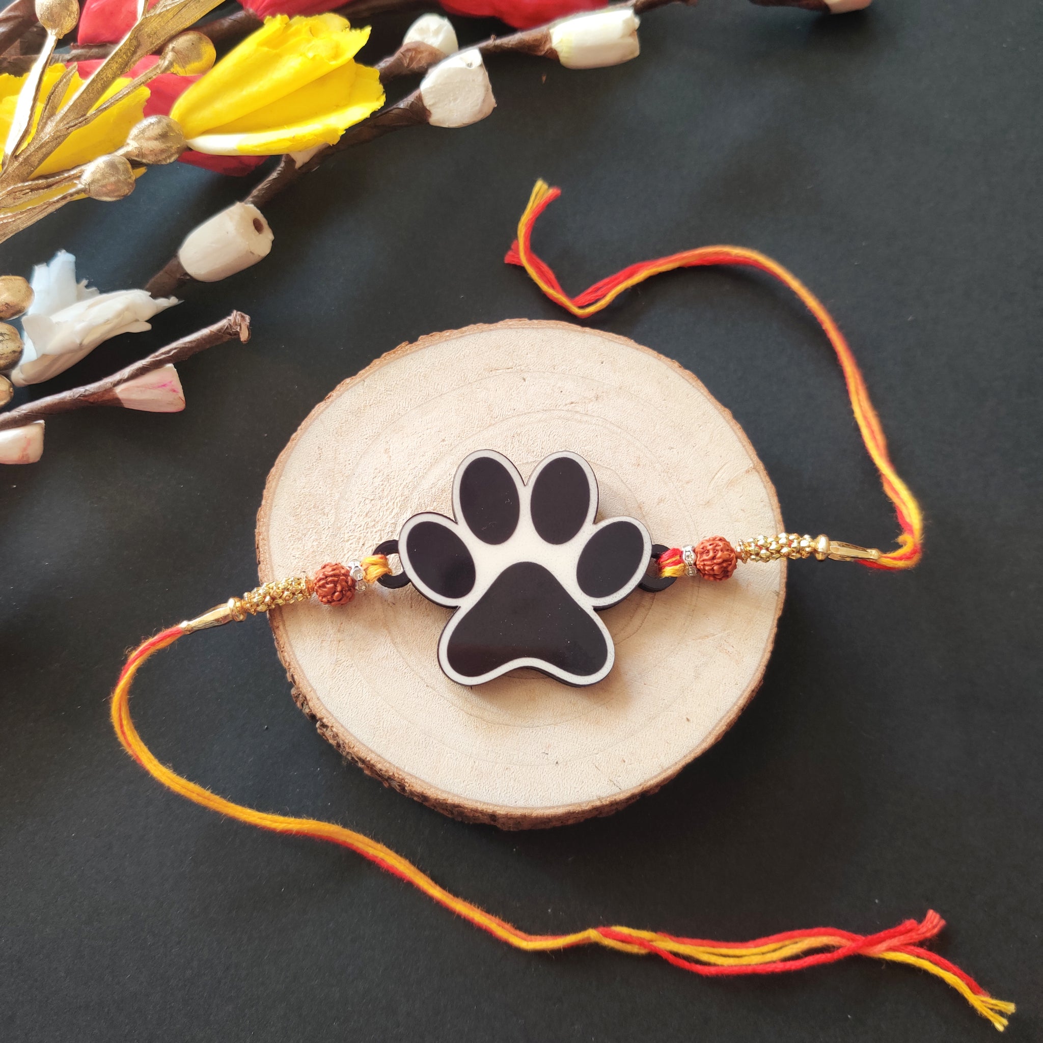 Dog paw wooden Rakhi – pet-themed Rakhi for Raksha Bandhan