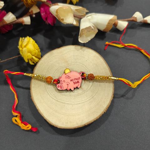 Piggy Bank Wooden Rakhi – cute handmade Rakhi for kids