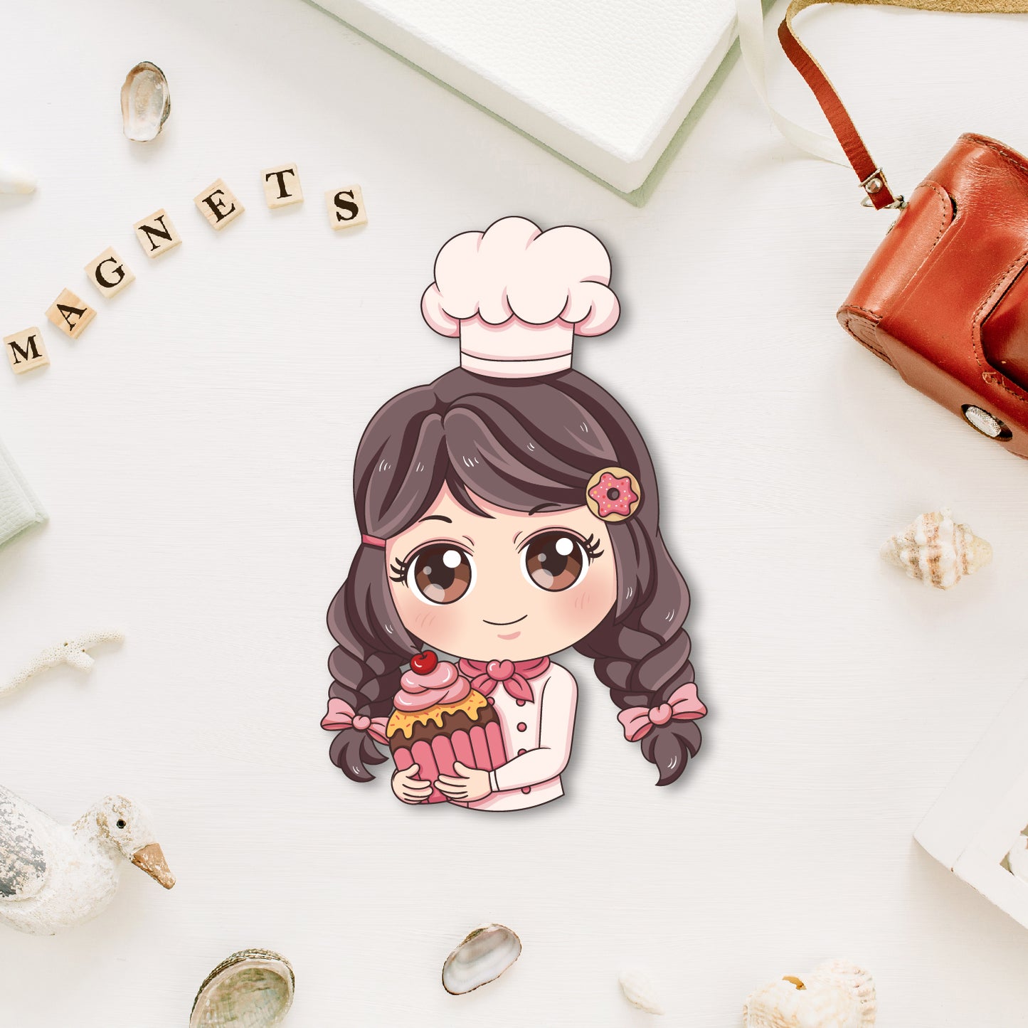 Baker fridge magnet wearing a chef's hat