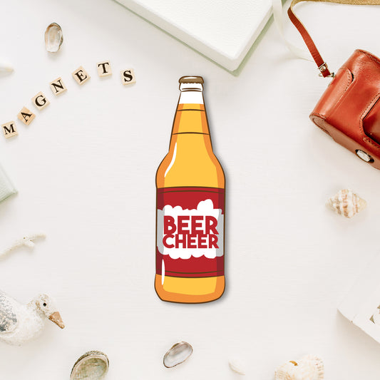 A miniature, lifelike beer bottle-shaped fridge magnet on a metallic surface.