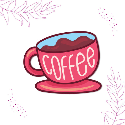 Close-up of a cute coffee cup magnet on a refrigerator.