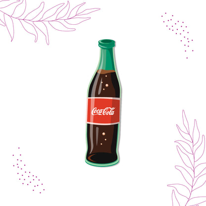 Close-up of a detailed Coca-Cola bottle magnet.