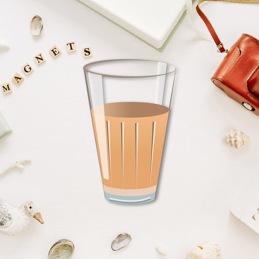 A miniature, realistic cutting chai tea glass-shaped fridge magnet.