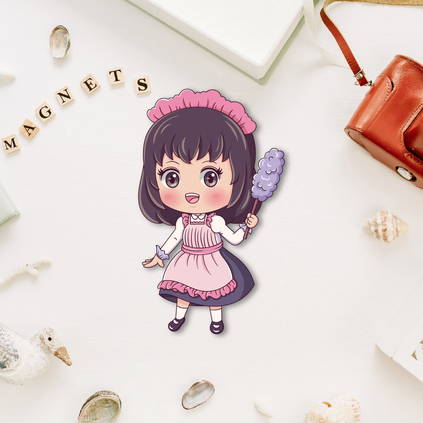 Housekeeper magnet with a broom