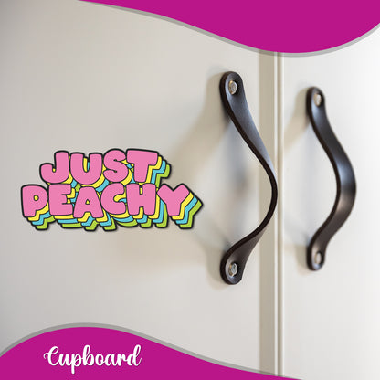 "Just Peachy" magnet on a refrigerator door.