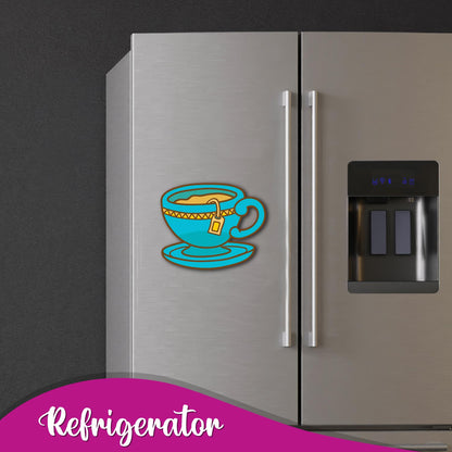 A decorative fridge magnet in the shape of a hot tea cup.