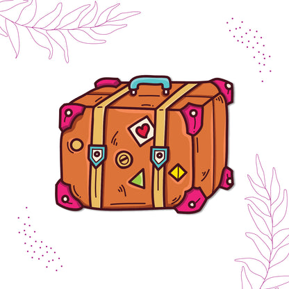 Decorative suitcase magnet for travelers.