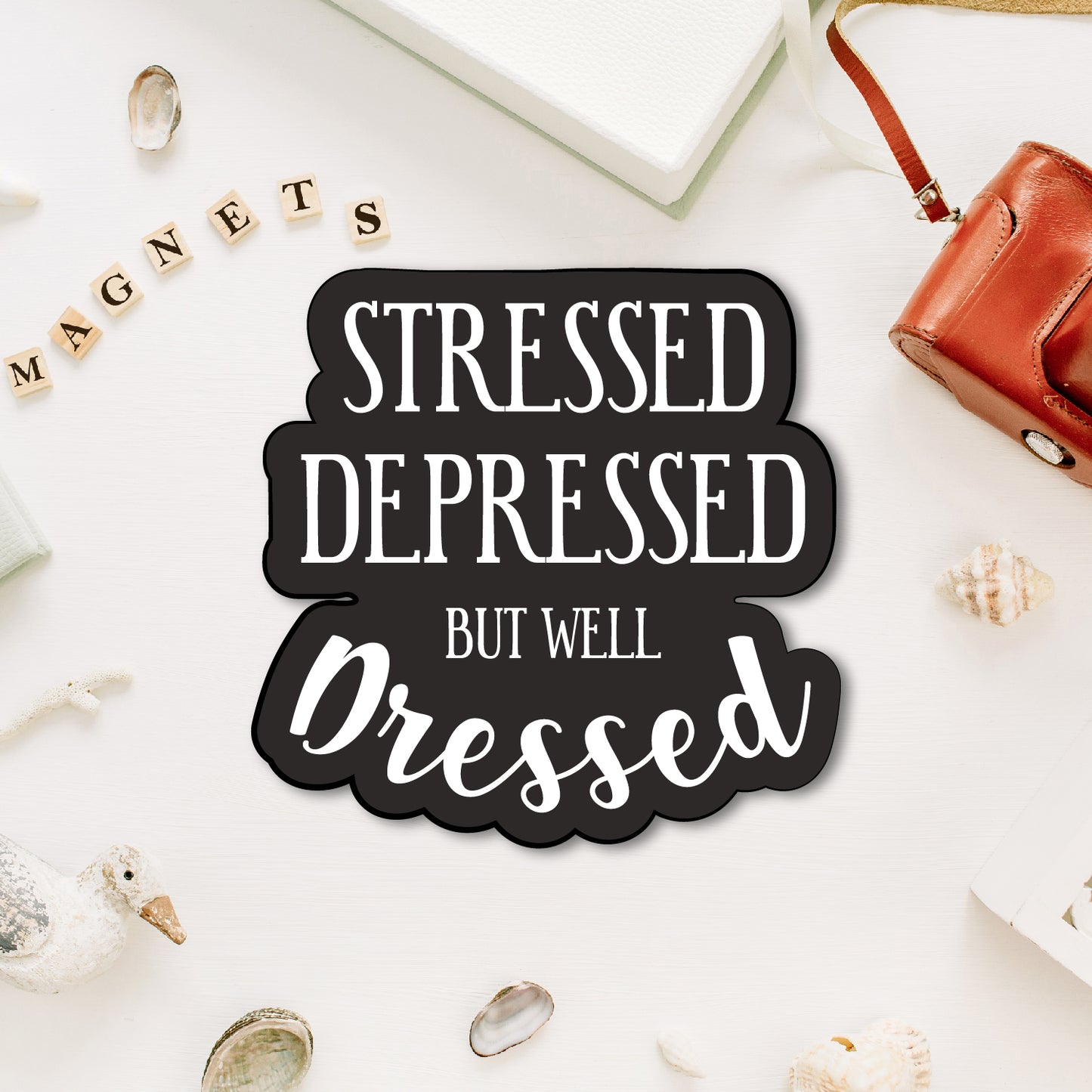 "Stressed but Well Dressed" funny quote magnet.