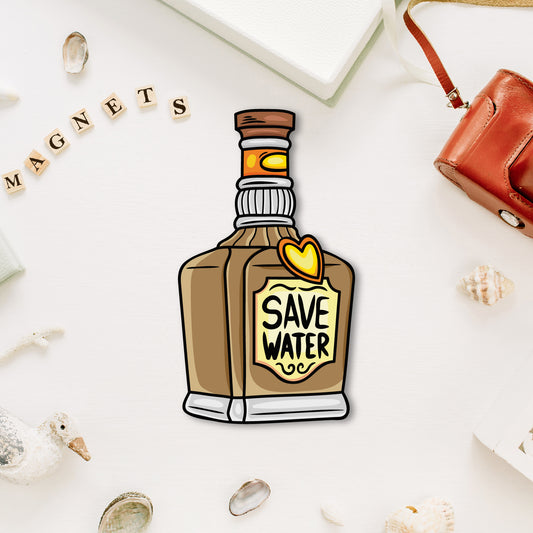 A miniature, realistic whiskey bottle-shaped fridge magnet with a label.