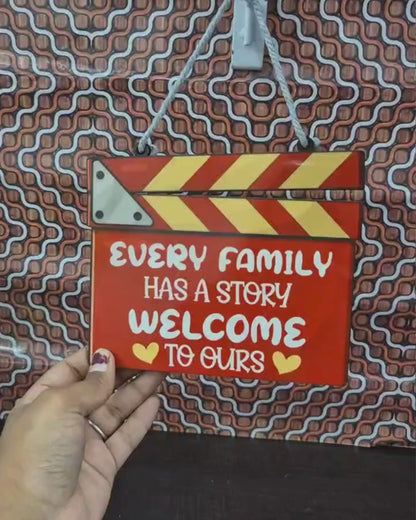 Every Family has a Story Welcome to Ours Wooden Wall Hanging