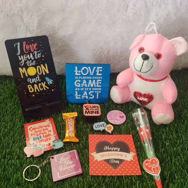 Valentine Gift (Hamper No 13)- 11 products (Mobile Stand , Desk Frame, Fridge Magnet ,Keychain ,Pop Socket, Badge, Lapel Pin, Card, Chocolate , Teddy and Rose)