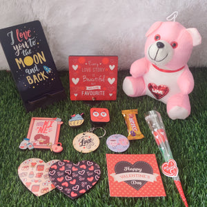 Valentine Jumbo Hamper - 12 products (Mobile Stand , Desk Frame, Fridge Magnet , Coaster , Pin , Badge , Keychain , Pop Holder, Card, Chocolate , Teddy and Rose