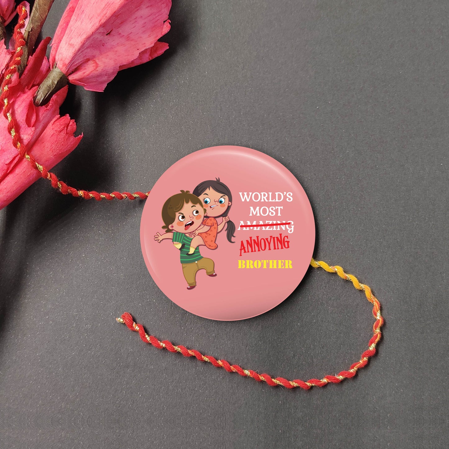 Annoying Brother Metal Rakhi on a thread, with Roli and Chawal for Raksha Bandhan.