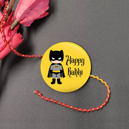 Batman Metal Rakhi on a thread, with Roli and Chawal for Raksha Bandhan.