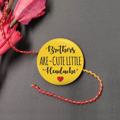 Brothers are Cute Little Headache Metal Rakhi on a thread, with Roli and Chawal for Raksha Bandhan.