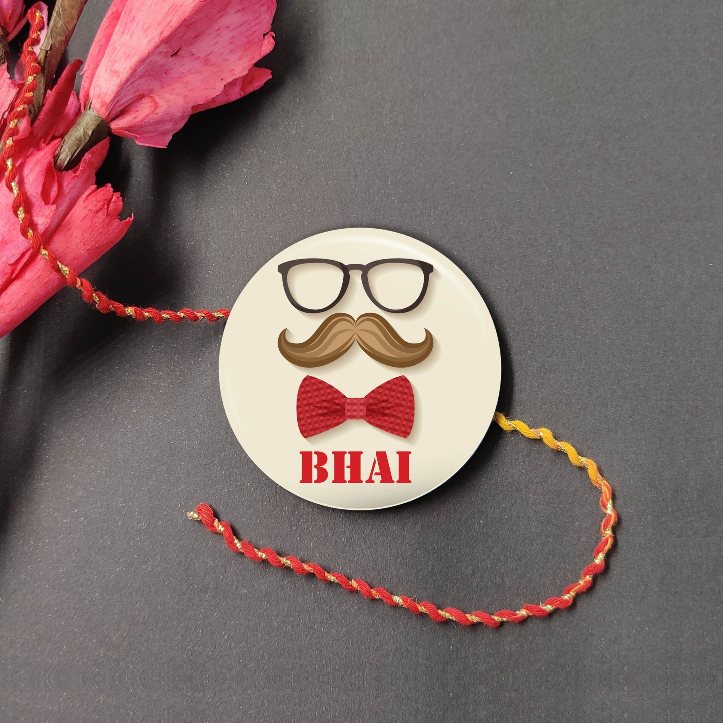 Moustache Bhai Metal Rakhi on a thread, with Roli and Chawal for Raksha Bandhan.