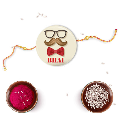 Brother smiling, stroking his moustache, admiring his new Moustache Bhai Metal Rakhi.