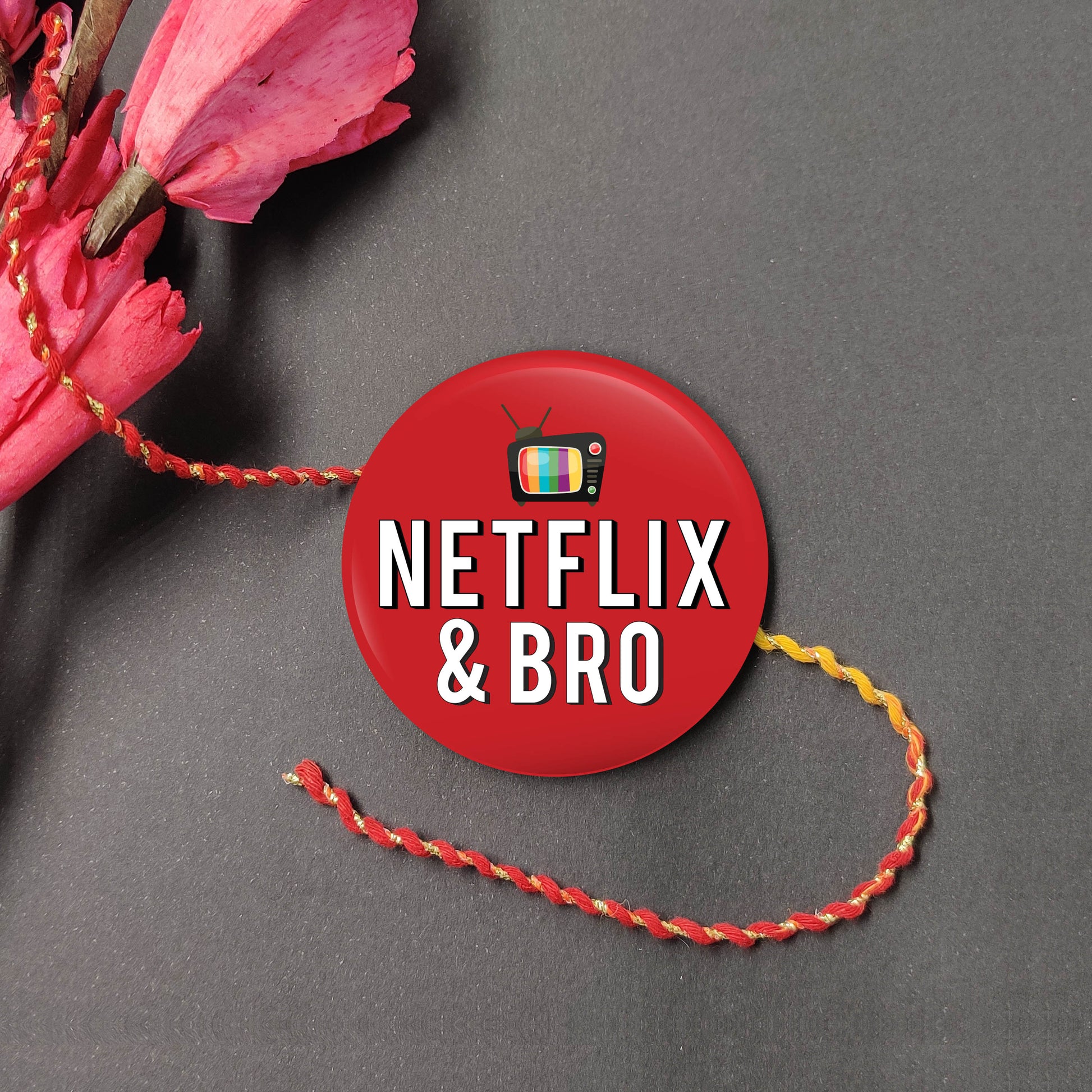 Netflix & Bro Metal Rakhi on a thread, with Roli and Chawal for Raksha Bandhan.