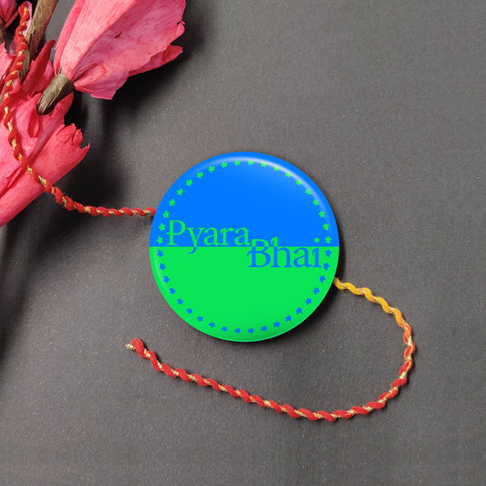 Pyara Bhai Metal Rakhi on a thread, with Roli and Chawal for Raksha Bandhan.