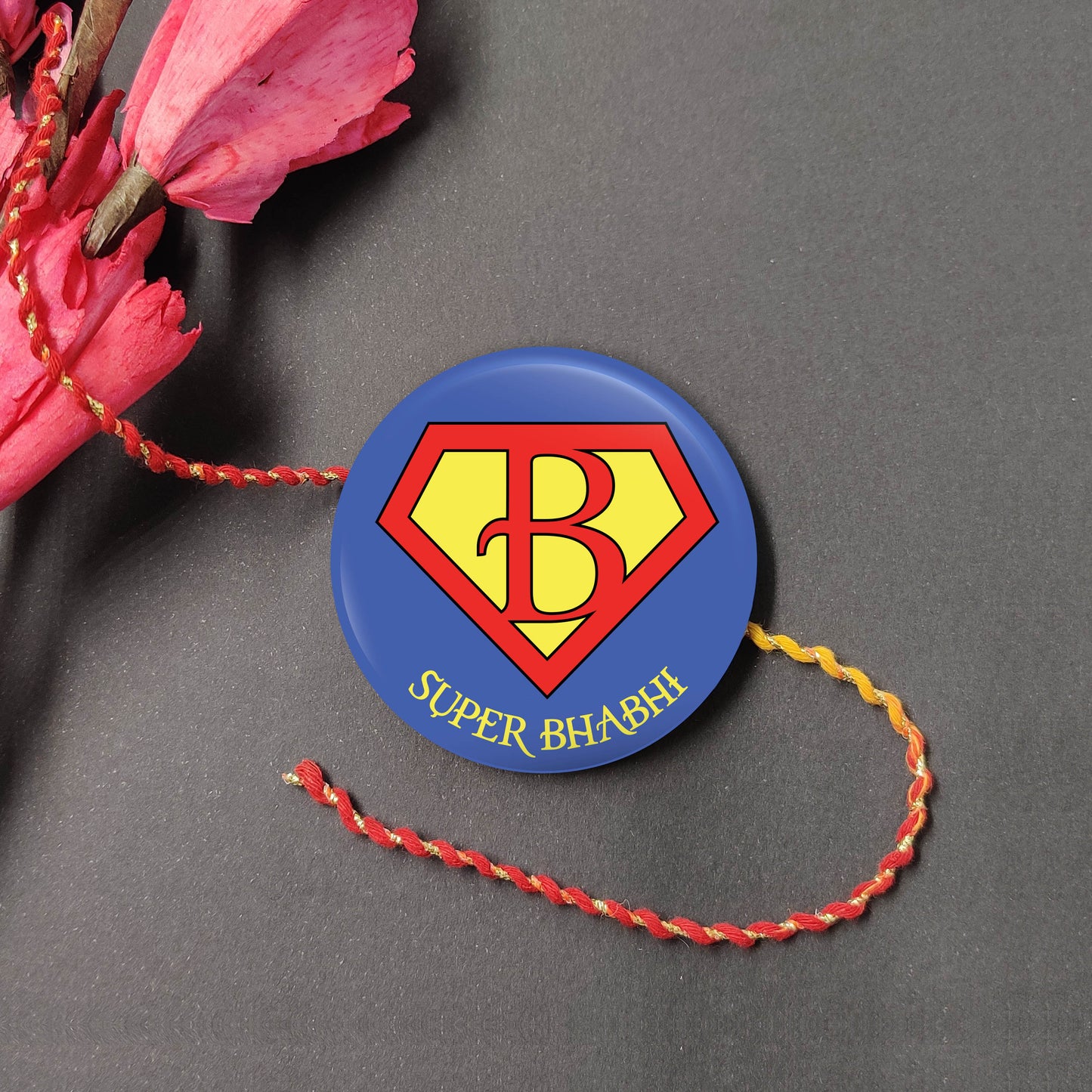 Super Bhabhi Metal Rakhi Lumba on a thread/tassel, with Roli and Chawal for Raksha Bandhan