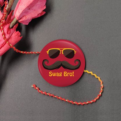 Swag Bro Metal Rakhi on a thread, with Roli and Chawal for Raksha Bandhan.