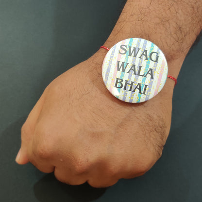 Swag Wala Bhai Rakhi shown both on a thread and as a fridge magnet.