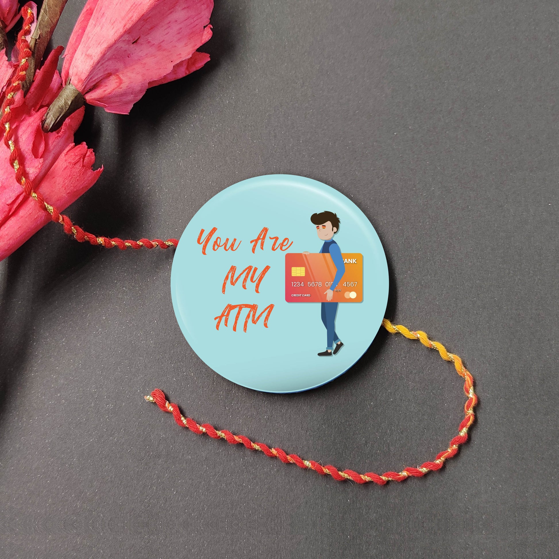 You are my ATM Metal Rakhi on a thread, with Roli and Chawal for Raksha Bandhan.