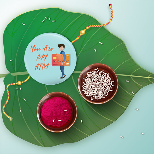 You are my ATM Rakhi shown both on a thread and as a fridge magnet.