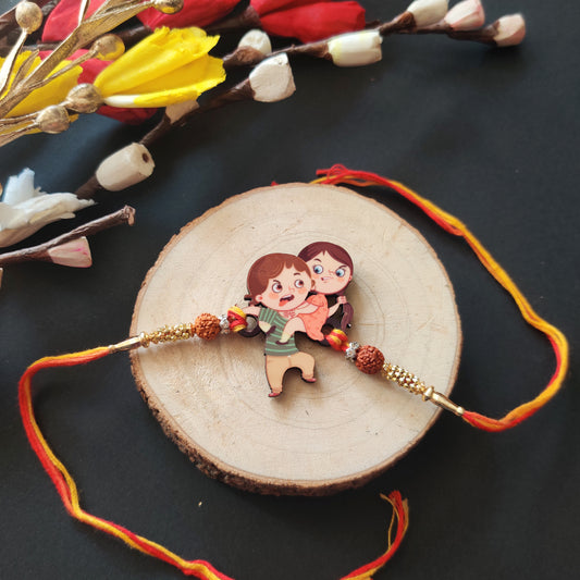 Annoying Brother Wooden Rakhi with Rudraksha thread, presented with Roli and Chawal.