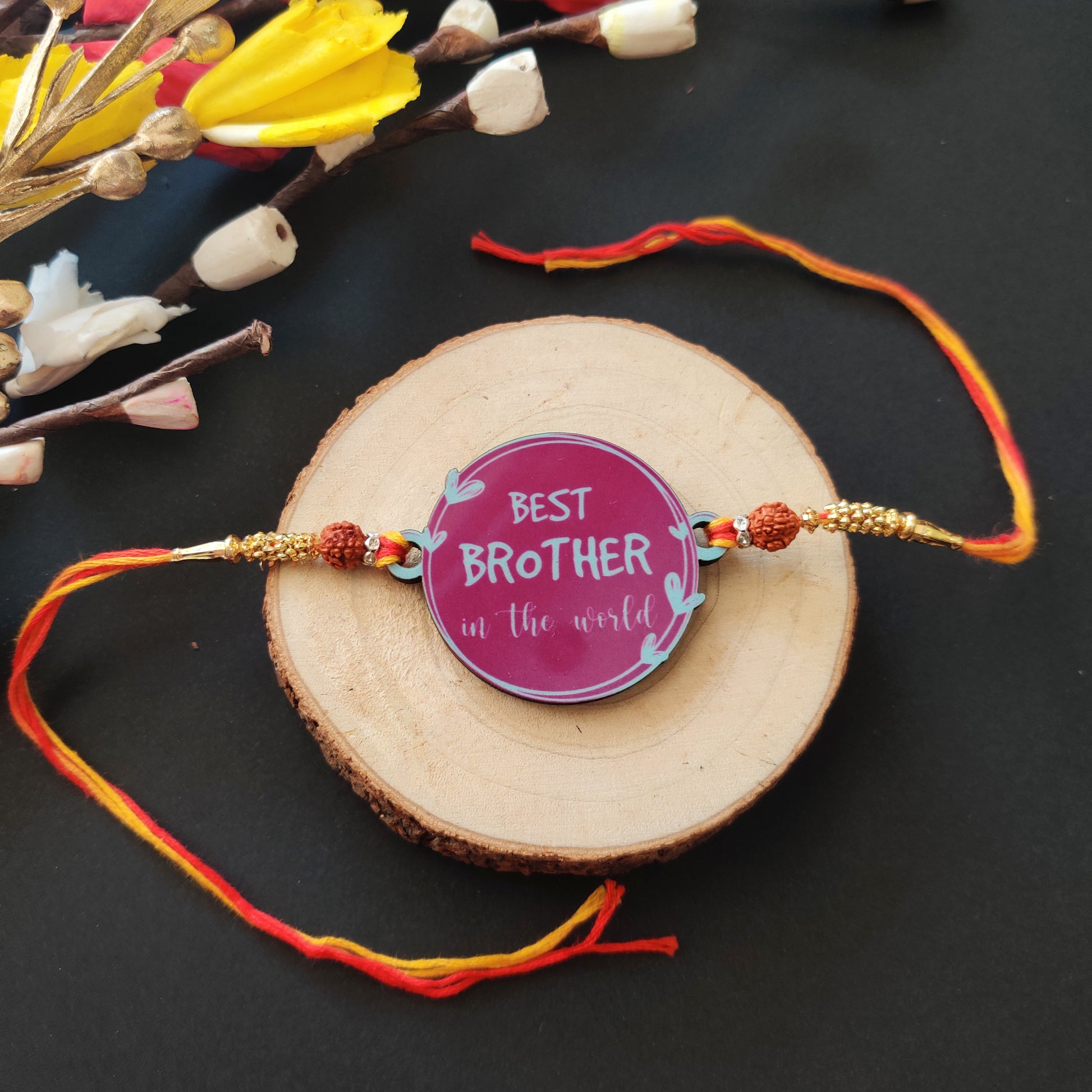 Best Brother in the World Wooden Rakhi with Rudraksha thread, presented with Roli and Chawal.