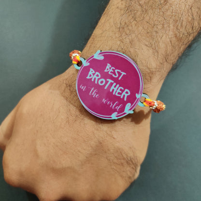 Best Brother in the World Wooden Rakhi with Rudraksha thread tied on a brother's wrist