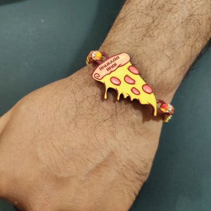 Close-up showing the genuine Rudraksha beads on the Rakhi thread alongside the pizza pendant