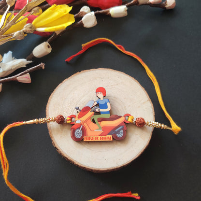 Biker Bhai Wooden Rakhi with Rudraksha thread, presented with Roli and Chawal for Raksha Bandhan.