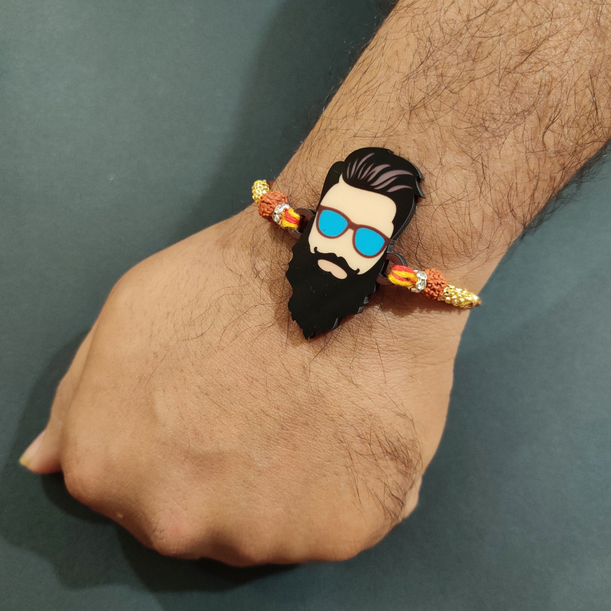 Stylish Dashing Bhai Wooden Rakhi with Rudraksha tied on brother's wrist
