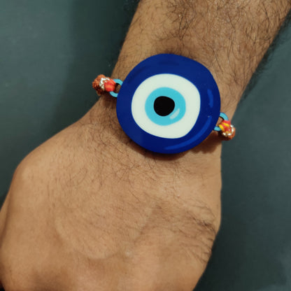 Raksha Bandhan Rakhi with Evil Eye and sacred Rudraksha thread
