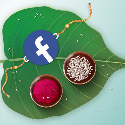 Close-up detail of Facebook 'F' logo or like button design on wooden Rakhi with Rudraksha beads.