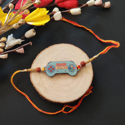 Gamer King Bhai Wooden Rakhi with Rudraksha thread, presented with Roli and Chawal.