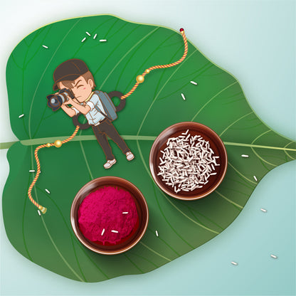 Close-up detail of camera symbol and 'Photographer Bhai' inscription on wooden Rakhi with Rudraksha beads