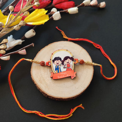 Happy Rakshabandhan Wooden Rakhi with Rudraksha thread, presented with Roli and Chawal.