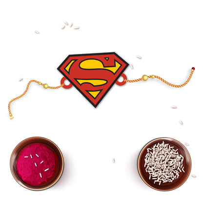 Superman Rakhi with Rudraksha placed against a comic book or superhero-themed backdrop.